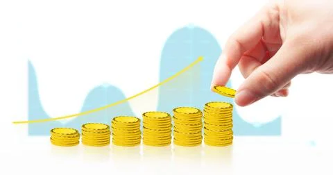 Hand is dropping gold coin on stack of coins with arrow up and business graph Foto stock