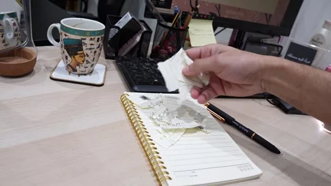 Hand Dropping Torn Paper On Office Desk Stock Footage 340254925