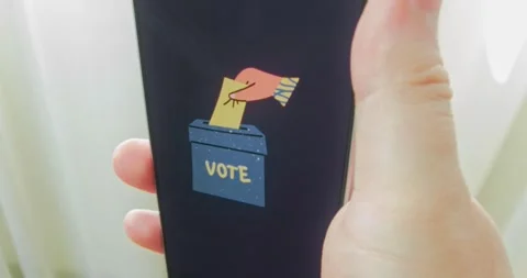 Hand drops ballot paper into voting box, presentation Stock Footage 313504317