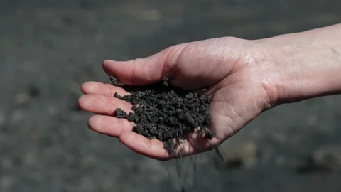 Hand drops scorched earth. Stock Footage 237077442