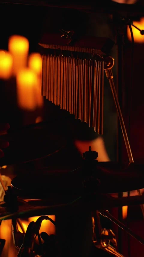 A hand with a drumstick playing drum bells, close-up Stock Footage 291180724