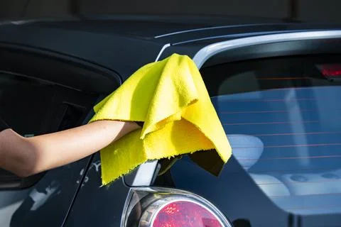 Hand Drying a Car with Microfiber Cloth After Washing Fotos Stock