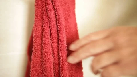 Hand drying with red towel 스톡 동영상 116901065