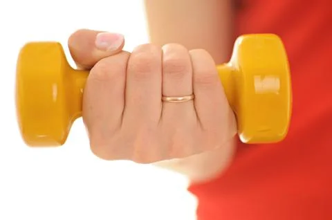 Hand with dumbbels Stock Photos