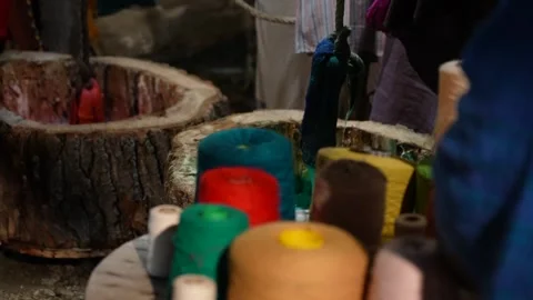 Hand Dyeing Yarn Threads in Colorful Textile Manufactory for Artisanal Carpet Stock Footage 327300950