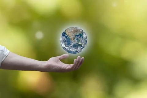 Hand with Earth. Environment, save clean planet, ecology concept. Stock Photos