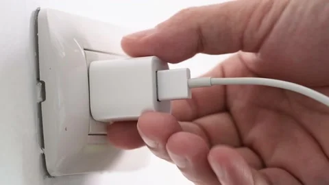 Hand of Electrical Appliances He was pulling the plug. Out of the plug. In his o Stock Footage 164518983