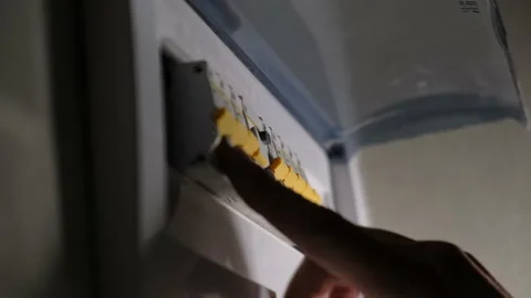 Hand of an electrician opening the dashboard of the electrical panel, closeup Stock Footage 234629287