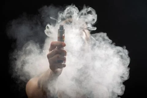 Hand with electronic cigarette Photos