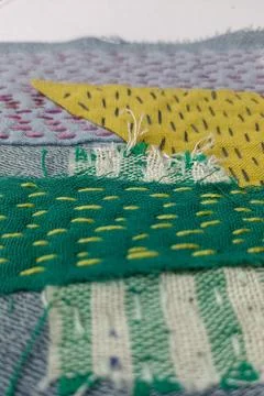 Hand Embroidered Textile Sample with Layered Fabrics. Stock Photos