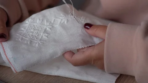 Hand embroidery techniques on delicate fabric for stunning home decor Stock Footage 306223523