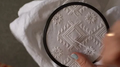 Hand embroidery techniques shown on white fabric Vídeos de archivo 337173440