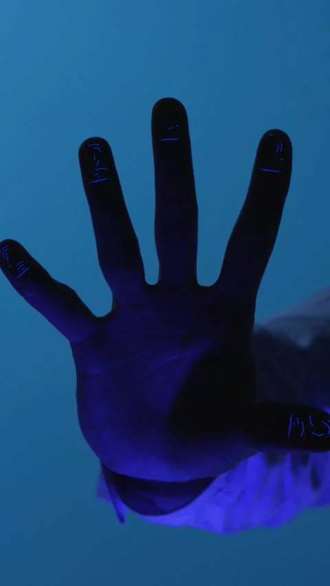 A hand emerges from blue water, symbolizing connection and serenity Stock Footage 316511330