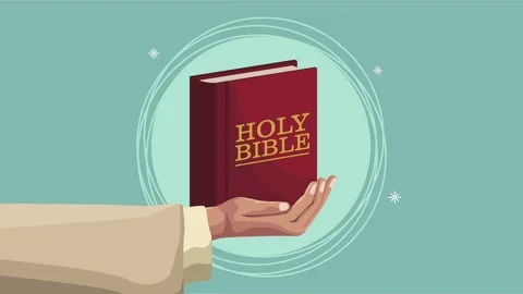 A hand emerging from the left side of the screen holding a holy bible, with.. Stock Footage 334533989