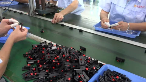 Hand of employees working at assembly line electronic factory in China Stock Footage 67549177