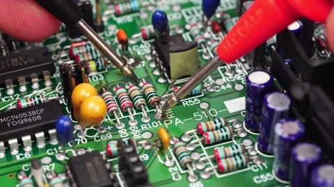 The hand of the engineer measures the voltage on the electrical board Stock Footage 169243091