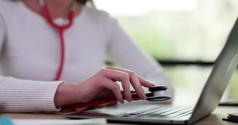 Hand of engineer or doctor checking condition of laptop computer using Vídeos de archivo 258327772