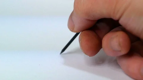 Hand engraves on a white sheet with a burin Stock-Footage 88040634