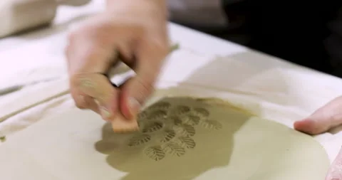 Hand Engraving Floral Pattern on Clay for Artistic Craft Project Stock Footage 304413149