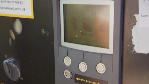Hand Enter data on the parkomat. Play parking machine. Los Angeles California Stock Footage 243072359