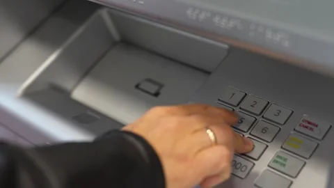 Hand enter pin code in cash machine, close-up Stock Footage 249596801