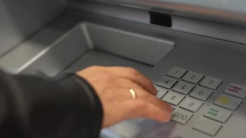 Hand enter pin code in cash machine, close-up Stock Footage 249596808