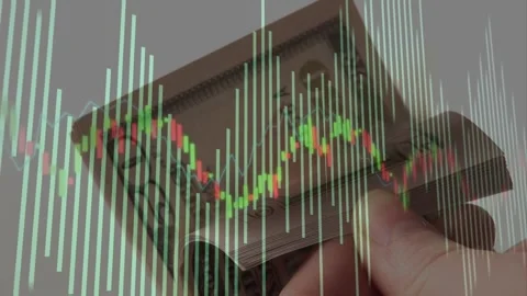 Hand entering frame, manipulating USD stack while chart pulsing, camera zooming, Stock Footage 328656806