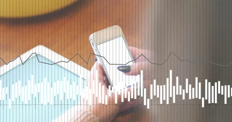 Hand entering frame with smartphone, worker tapping screen and browsing tech Stock Footage 312348604