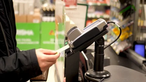 Hand entering pin code at grocery store or supermarket cash register. 4K UHD Stock Footage 83470206