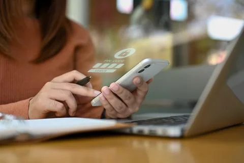 Hand entering pin code on mobile phone, User privacy security and protect Stock Photos