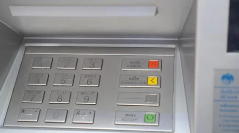 Hand Enters ATM PIN Code to Withdraw Money near Bank. Stock Footage 66542443