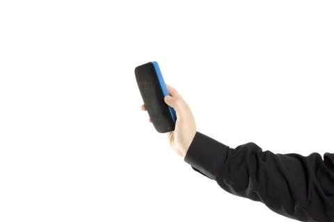 Hand erasing the whiteboard Stock Photos