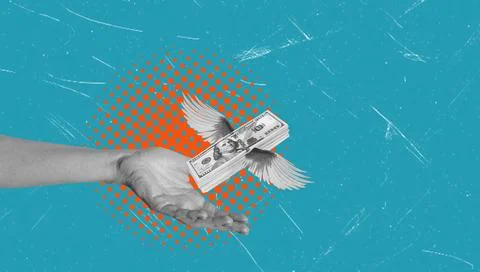 A hand extends forward as stacks of money take flight with wings. The backgro Stock Photos
