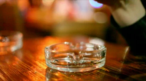 Hand extinguish butt in ashtray Video stock 374248