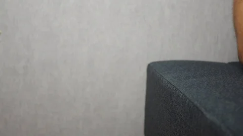 Hand falling down on the edge of bed close up Stock Footage 90476095