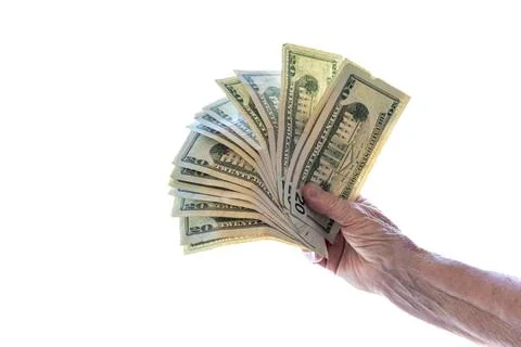 Hand fanning stack of twenty dollar bills isolated on white Photos