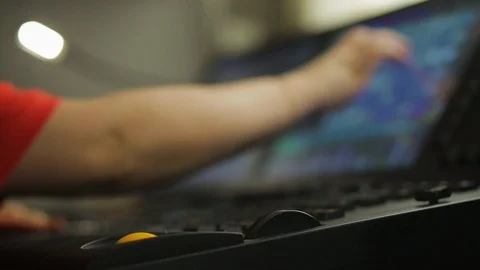 The hand of a female lighting designer at the console programs the stage light Stock Footage 126236861