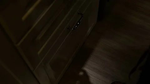 Hand of female pick up two glass from cabinet Stock Footage