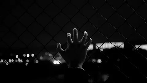 Hand on fence Video stock 111938143