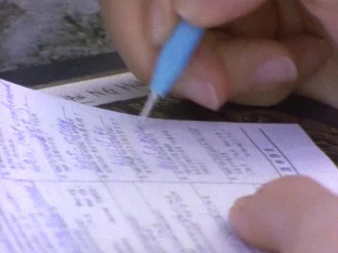 Hand filling in the visa form Stock Footage 79878089