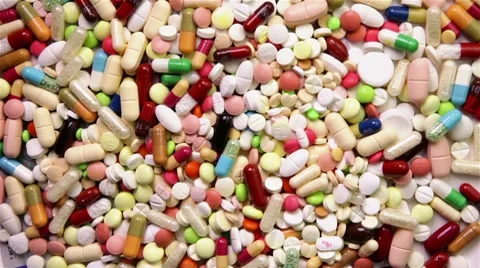 Hand finding euro under pills Stock Footage 7130087
