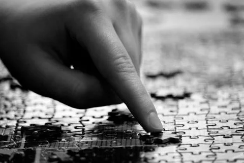 Hand Finger Puzzle Completing for Fun and Achievement Stock Photos