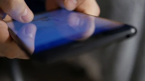The hand (finger) work with phone touchscreen. Close up macro view Stock Footage 126774002