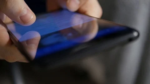 The hand (finger) work with phone touchscreen. Close up macro view Stock Footage 126774009