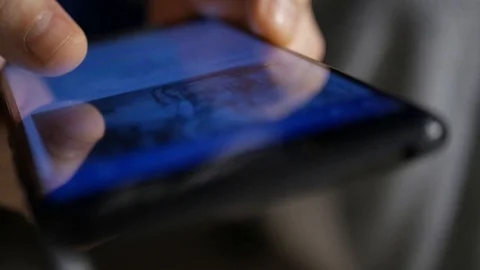 The hand (finger) work with phone touchscreen. Close up macro view Stock Footage 126774011