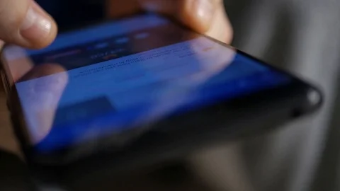 The hand (finger) work with phone touchscreen. Close up macro view Stock Footage 126774014