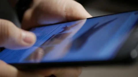 The hand (finger) work with phone touchscreen. Close up macro view Stock Footage 126774020