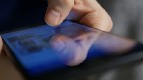 The hand (finger) work with phone touchscreen. Close up macro view Stock Footage 126774028