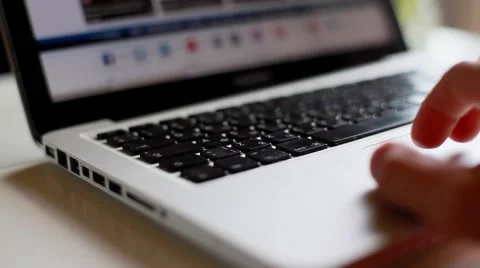 Hand fingers scroll touchpad of laptop computer internet networks pages search Stock Footage 65016542