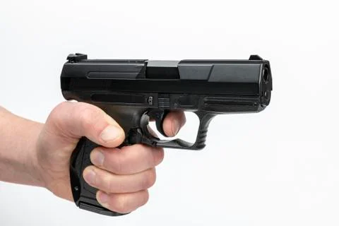 Hand with firearm. Stock Photos